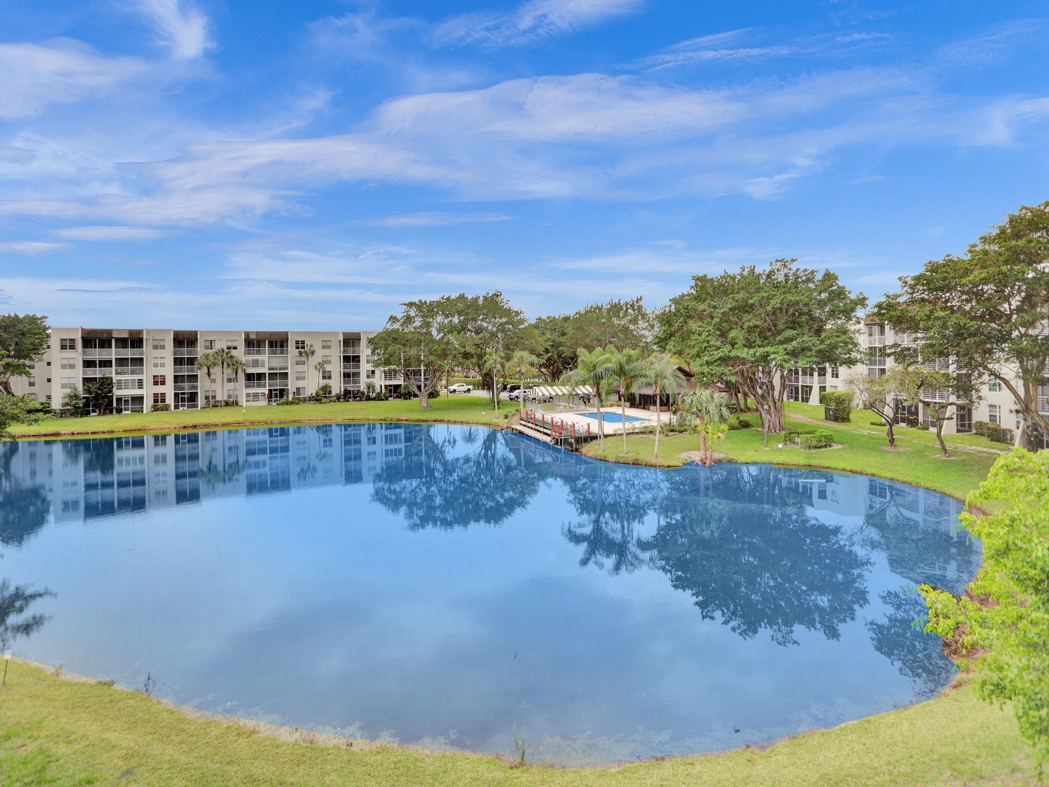 SUPER ONE BEDROOM WITH UPDATED KITCHEN AND BATH, GRANITE COUNTERTOPS, TILE AND LAMINATE FLOORING, SCREEN PATIO. NEW A/C INSTALLED MARCH 2022. THIS APARTMENT IS LOCATED IN PRIVATE PINE ISLAND RIDGE COUNTRY CLUB, WHICH OFFERS AMENITIES SUCH AS GOLF TENNIS SAUNA STEAM WORKOUT FACILITY SPORTS BAR AND PRIVATE DINING ROOM. NSU AND DAVIE COLLEGES 10 MIN. PRIVATE COUNTRY CLUB COMMUNITY * EXECUTIVE GOLF COURSE * TENNIS*PICKLEBALL, BOCCE BALL * GYM, SPORTS BAR * FINE DINING ROOM ARE INCLUSIVE WITH OWNERSHIP *