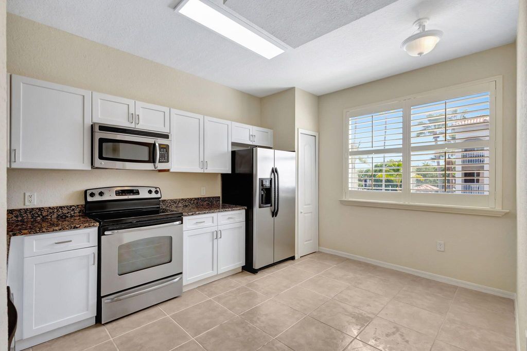 Photo of 11039 Legacy Boulevard #203, Palm Beach Gardens, FL 33410 (MLS # R11084568)