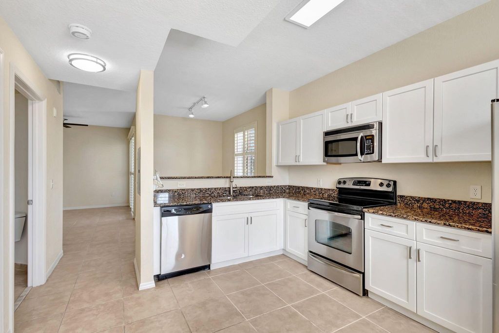 Photo of 11039 Legacy Boulevard #203, Palm Beach Gardens, FL 33410 (MLS # R11084568)