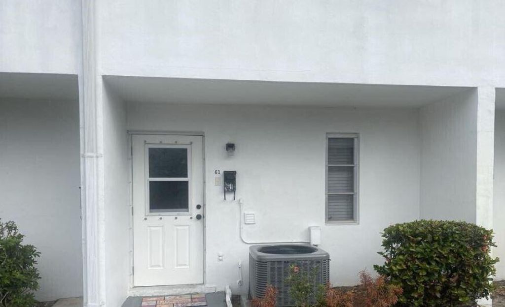 Photo of 61 East Court, Royal Palm Beach, FL 33411 (MLS # B26021282)