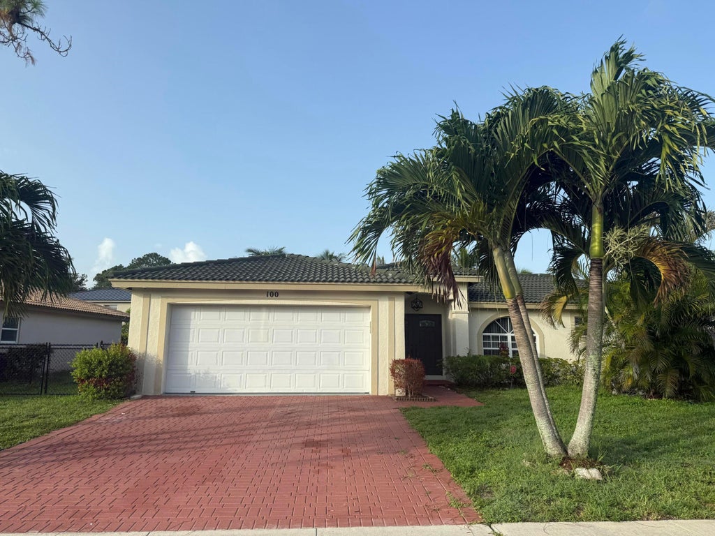 Photo of 100 Cocoplum Circle, Royal Palm Beach, FL 33411 (MLS # B26050935)