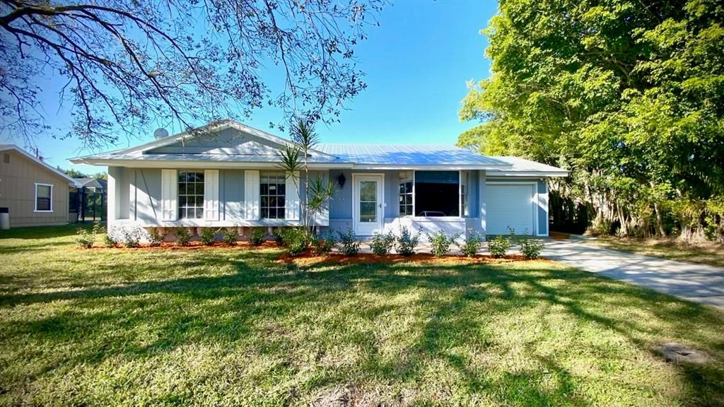 Photo of 1018 SE Proctor Lane, Port Saint Lucie, FL 34983 (MLS # R10687012)