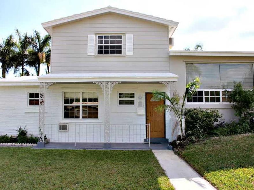 Great home with beautiful new kitchen & appliances, bathrooms and hard wood floors throughout. Oversized back yard with room for a pool. 1st level has 1 bed/bath and a large open space. Let your imagination run wild!  Could be your "mega  master bed/ensui t bath or Man Cave/Game Room"  This home is less than 1 mile from Gulfstream Park, Young Circle, Fine dining, shopping, schools & the BEACH!!  This is a must see property that you don't want to miss out on! Get your offers in before its to late!