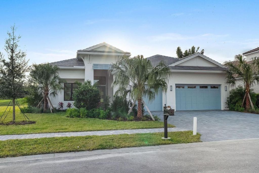 Photo of 110 SE Via Verona, Port Saint Lucie, FL 34984 (MLS # R11158350)