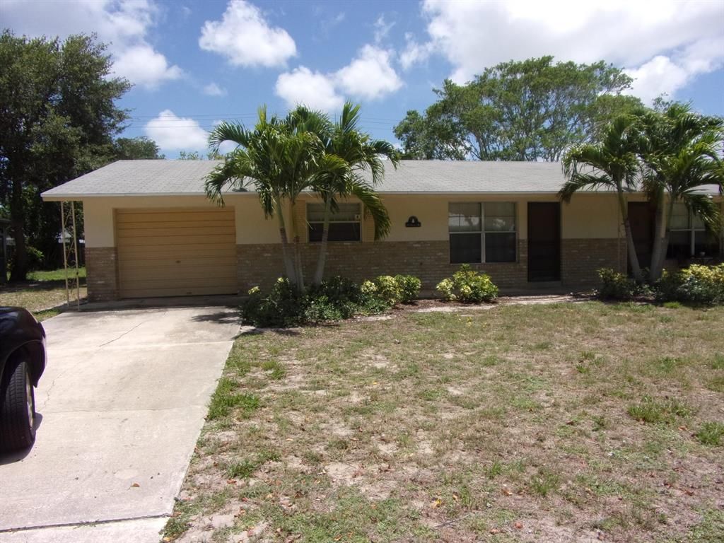 Photo of 2322 NE Tropical Way Way, Jensen Beach, FL 34957 (MLS # R10824156)