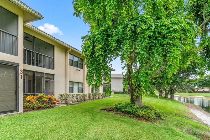 First Floor Unit - Priced to Sell! Enjoy a screened porch with serene views of the canal and green space—perfect for relaxing outdoors, rain or shine. This immaculately maintained condo features a cozy breakfast nook, a formal dining area off the living room and a stacked washer/dryer in the kitchen. Conveniently located just steps from the community pool. Located in desirable Hunters Run Country Club. Mandatory equity buy-in and annual membership. Enjoy 3 championship golf courses, 18 tennis and 12 pickleball courts, a resort-style pool with poolside bar, indoor and outdoor dining venues, a state-of-the-art gym, spa and salon, and year-round entertainment—all just minutes from Downtown Delray and the beach!