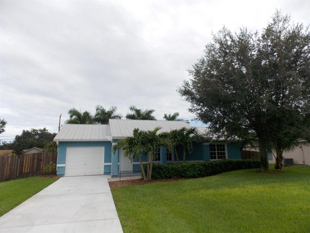 Photo of 2082 SW Cycle Street, Port Saint Lucie, FL 34953 (MLS # R10739584)