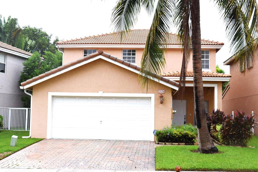 Wonderful property in moving condition with beautiful lake waterfront view from the kitchen, dining room and Master Bedroom area, 3 Bedroom 2.5 bath tile throughout on the first floor, kitchen with all new stainless steal appliances and A/C installed in 2024, carpet in the second floor , walking closet in the master bedroom , tray ceiling. Roof just inspected by a License Roofing Company confirming life expectancy.  Liberty Isles gated community, with low HOA. Amenities include: Clubhouse, large pool, spa, fitness center, tennis courts, kids playground you must see to appreciate