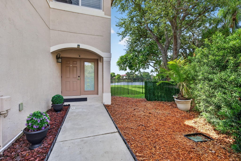 Photo of 9730 NW 23rd Court #15, Pembroke Pines, FL 33024 (MLS # B26077047)