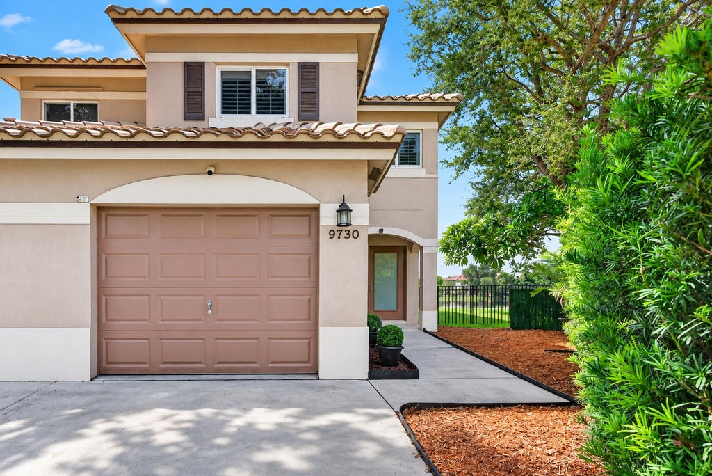 Photo of 9730 NW 23rd Court #15, Pembroke Pines, FL 33024 (MLS # B26077047)