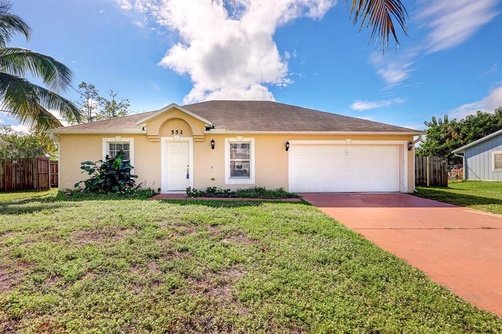 Photo of 552 SW Sansom Lane, Port St Lucie, FL 34953 (MLS # R10847576)