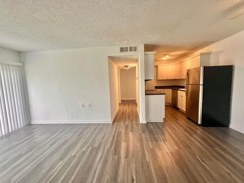 Photo of 1215 N Benoist Farms Road #203, West Palm Beach, FL 33411 (MLS # B26030402)