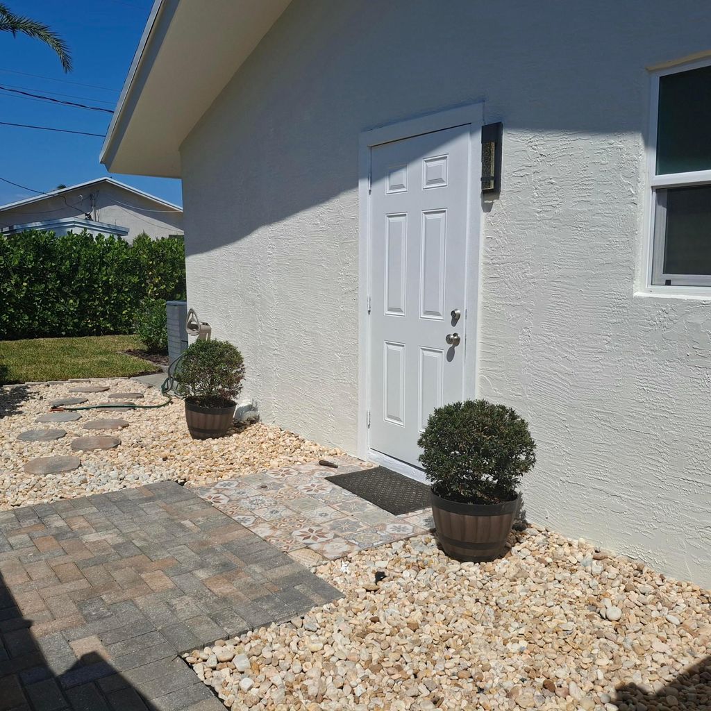 Photo of 1097 Wilkinson Road #B, Lake Worth, FL 33462 (MLS # B26008978)