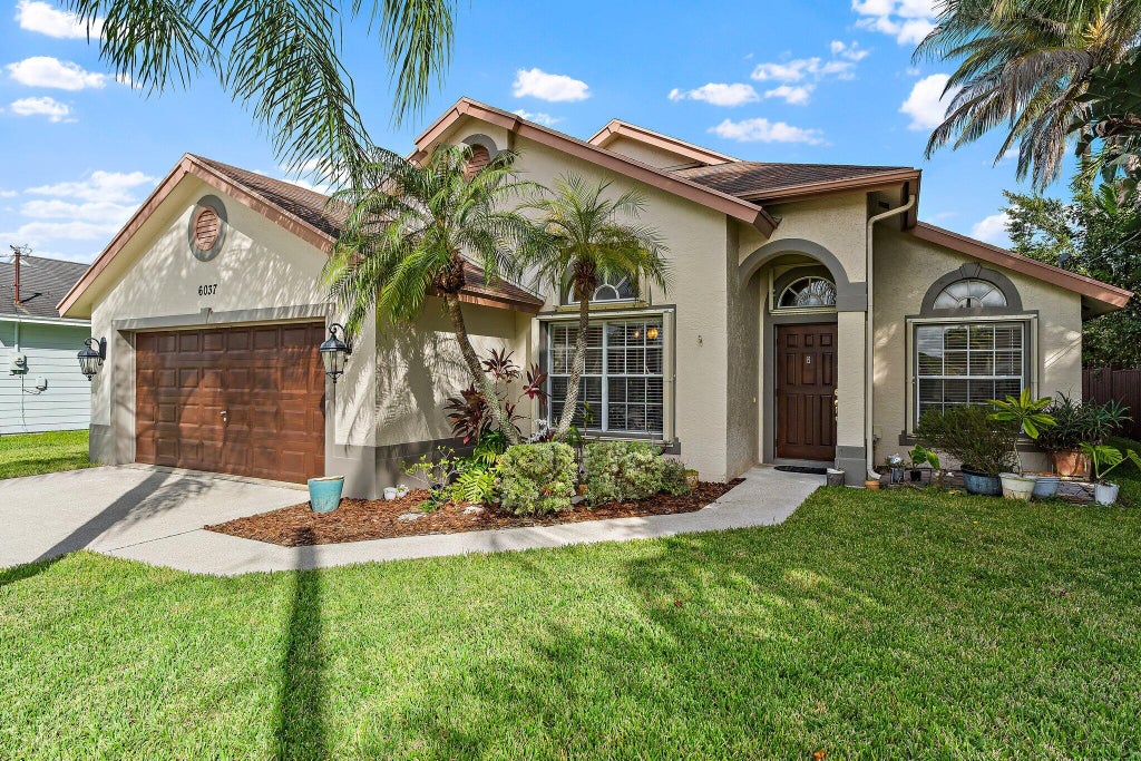 Photo of 6037 Foster Street, Jupiter, FL 33458 (MLS # B26090561)