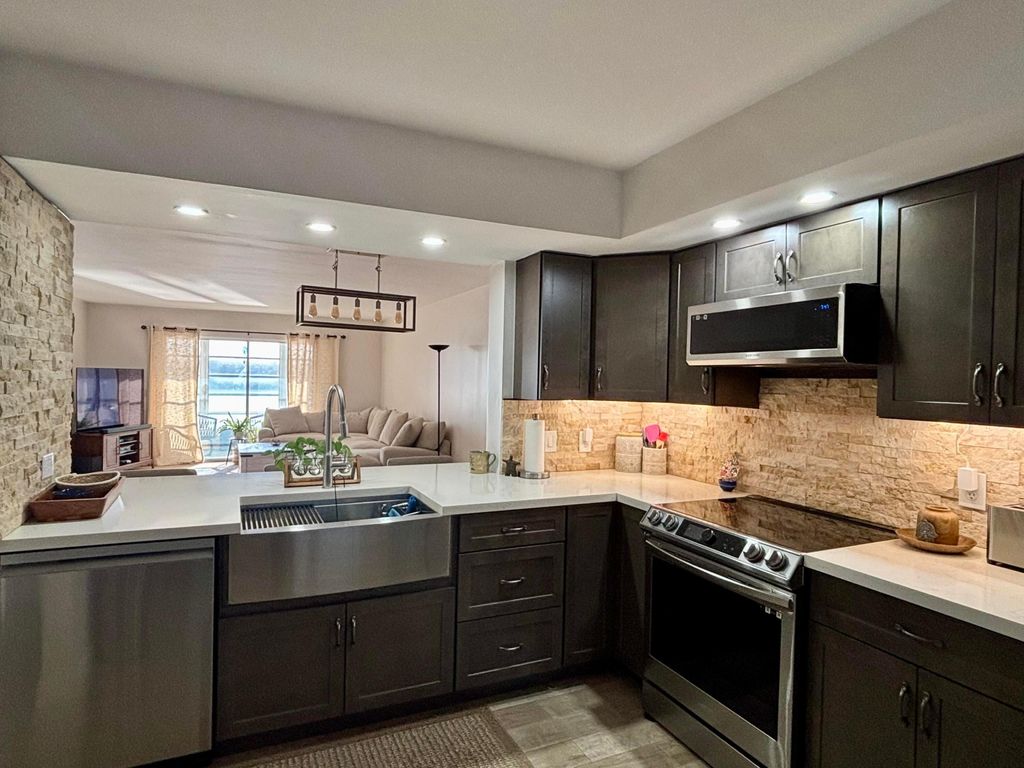 Photo of 1501 SW 134th Way #304d, Pembroke Pines, FL 33027 (MLS # B26007683)