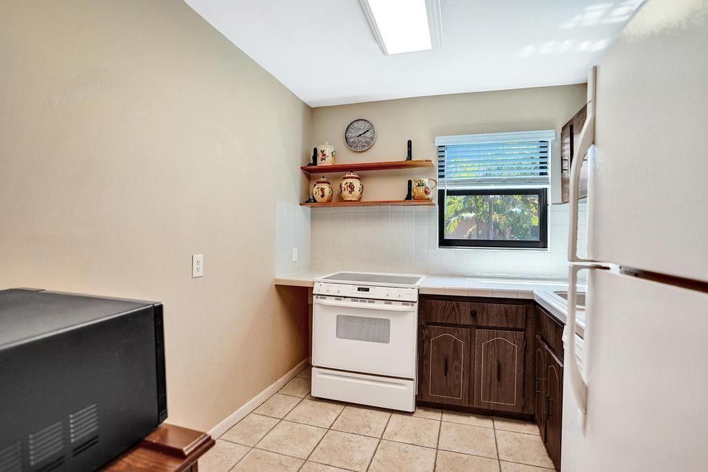 Photo of 8851 N New River Canal Road #17E, Plantation, FL 33324 (MLS # F10499205)