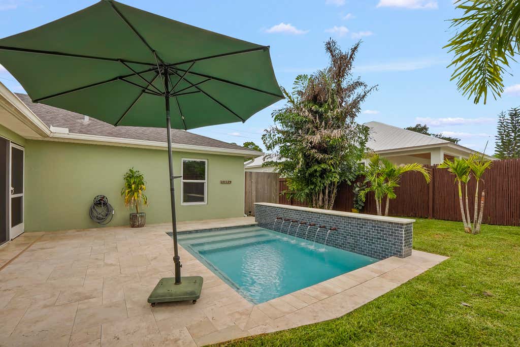 Photo of 1901 SW Import Drive, Port Saint Lucie, FL 34953 (MLS # B26056041)