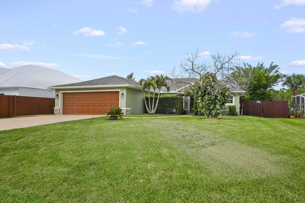 Photo of 1901 SW Import Drive, Port Saint Lucie, FL 34953 (MLS # B26056041)