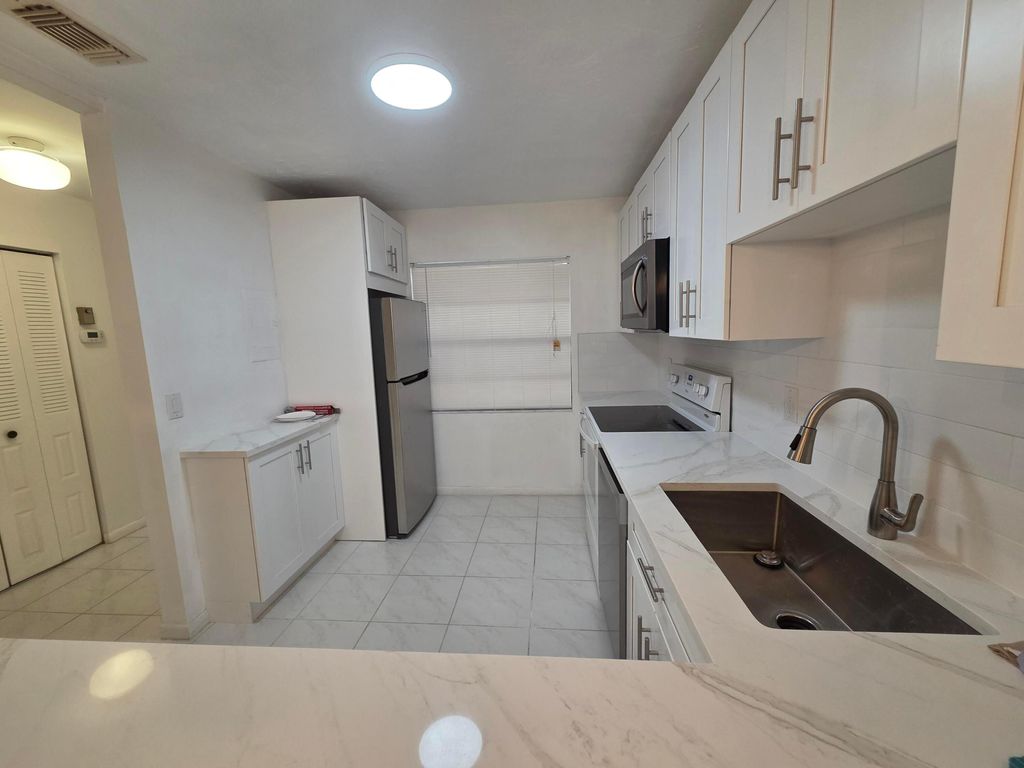 Photo of 9187 Norte Lago #5e, Boca Raton, FL 33428 (MLS # R11156937)