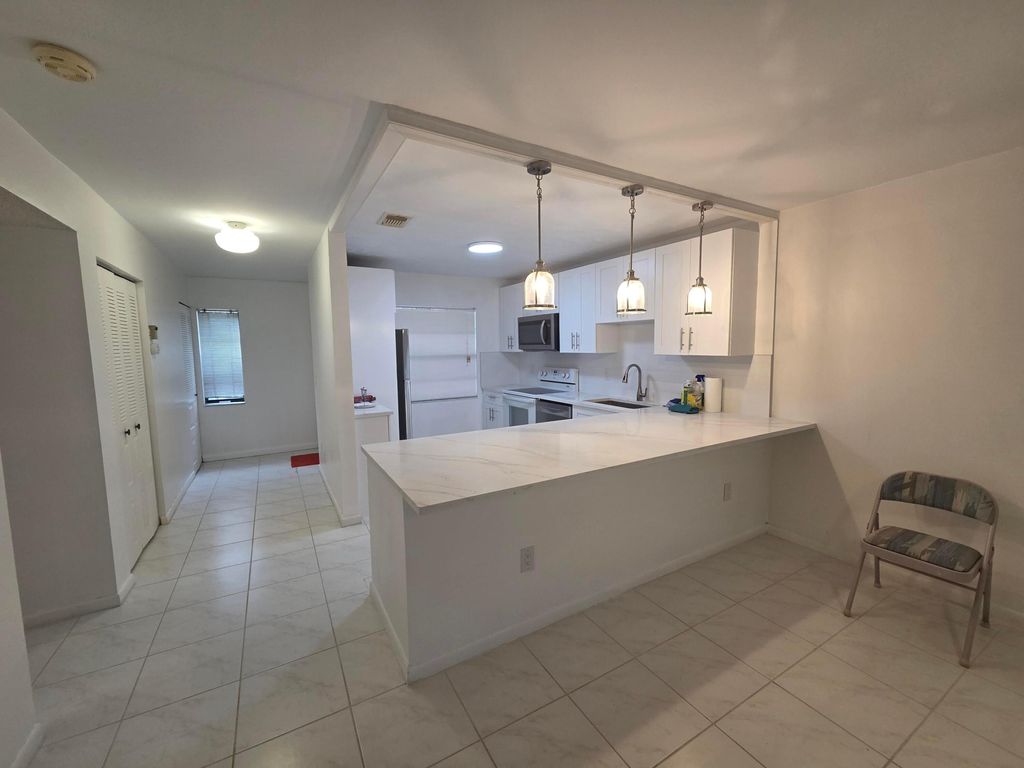 Photo of 9187 Norte Lago #5e, Boca Raton, FL 33428 (MLS # R11156937)
