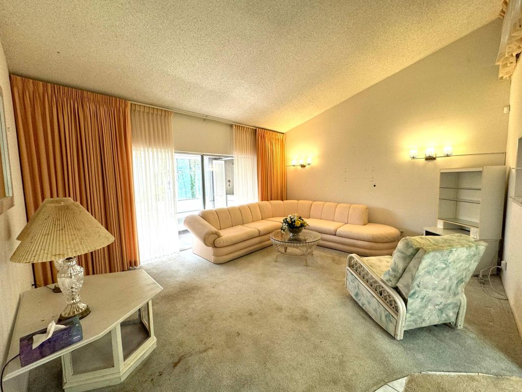 Photo of 2650 Boundbrook Boulevard #111, Palm Springs, FL 33406 (MLS # R10985312)