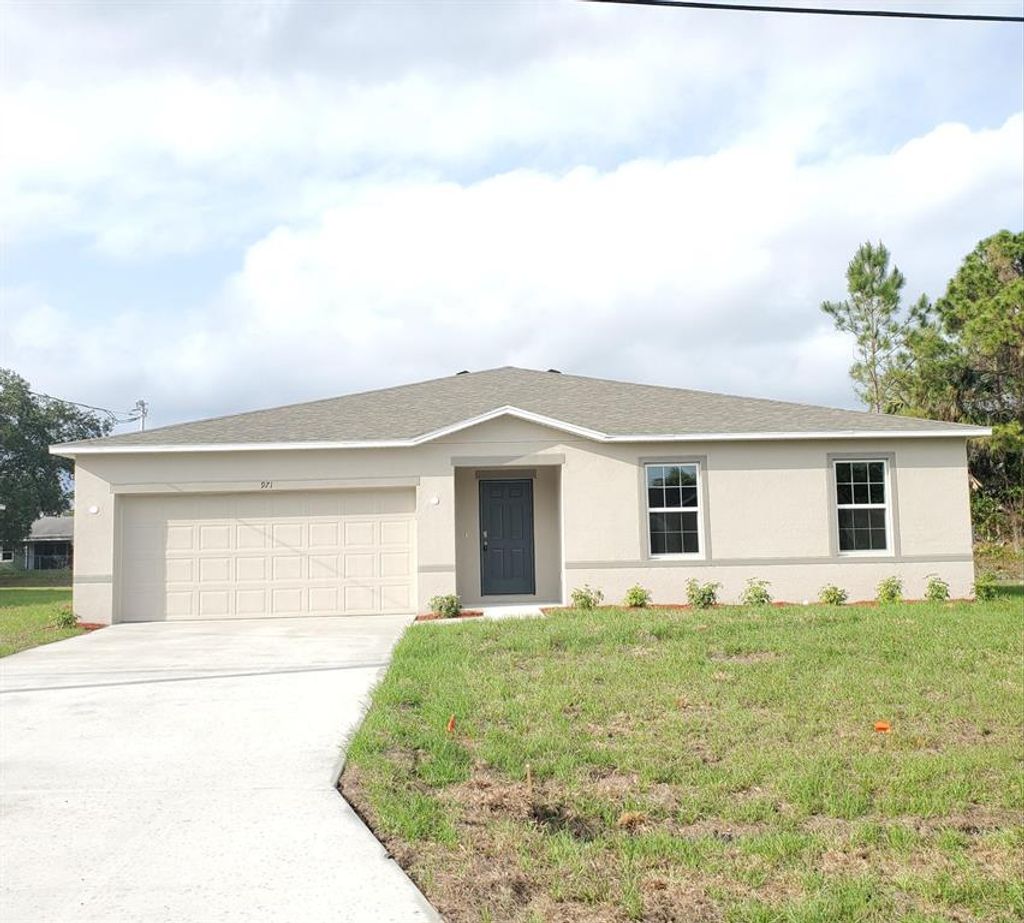 Photo of 971 SW Nichols Terrace, Port Saint Lucie, FL 34953 (MLS # R10748702)