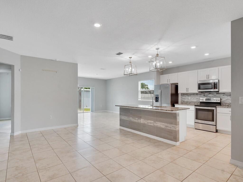 Photo of 5278 NW North Macedo Boulevard, Port Saint Lucie, FL 34983 (MLS # R11114314)