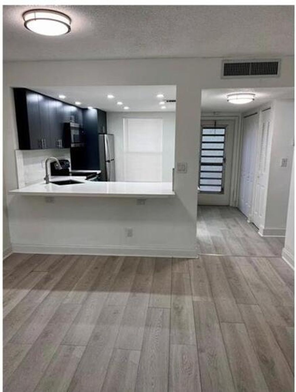 Photo of 6001 NW 61st Avenue #102, Tamarac, FL 33319 (MLS # B26004783)