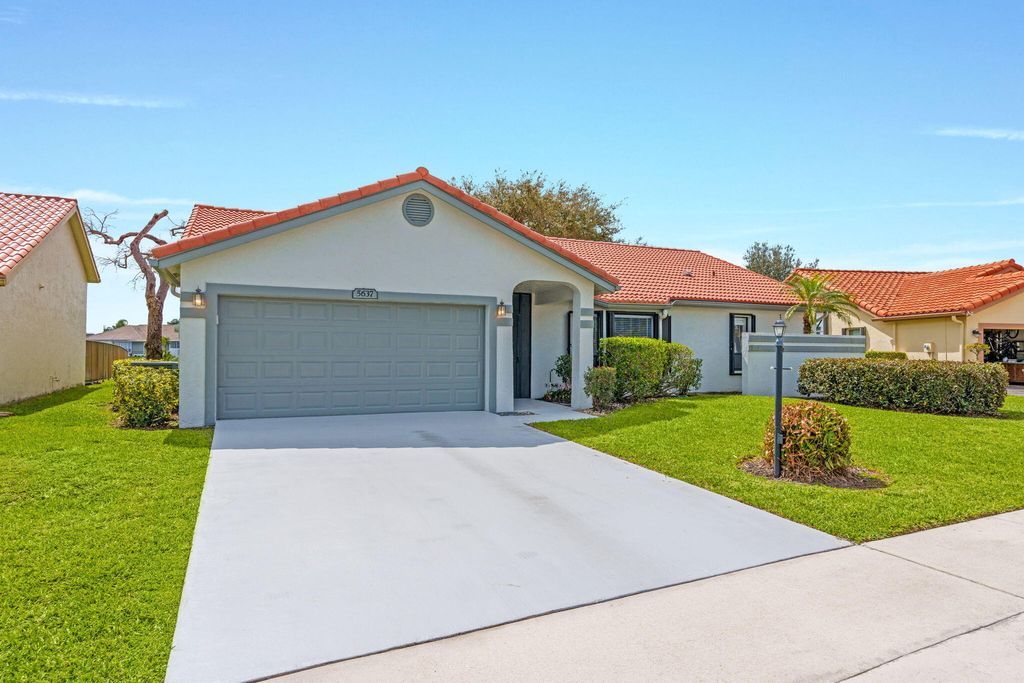 Photo of 5637 Egret Isle Trail, Lake Worth, FL 33467 (MLS # R11168357)