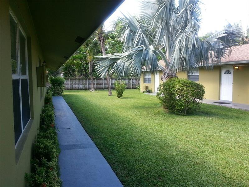 A pretty little oasis surrounded by beautiful townhomes! So close to downtown, yet minutes to Wilton Dr, Riverwalk or I-95! Gated property, large 2 bedroom, 1 bath with impact windows, eat-in kitchen & back door just off the kitchen. Newer appliances. Lots of light. Large lush courtyard between buildings, with lovely foliage, very serene. Laundry on premises. If you haven't been in this area lately, you'll be very surprised! Application fee $75. Move in Money based on credit. Speedy Approval. Must See!!!