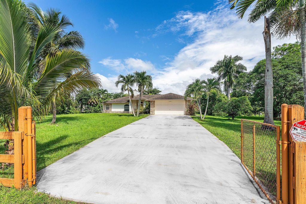 Photo of 12229 61st Lane N, The Acreage, FL 33412 (MLS # R11139100)