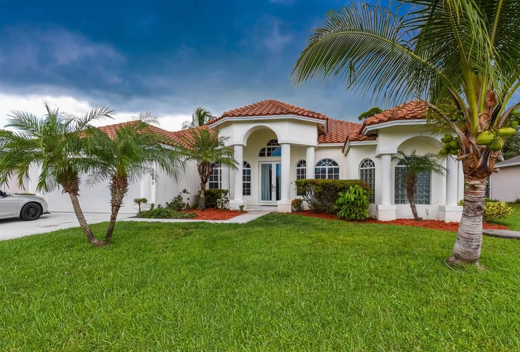 Photo of 2849 SE Buccaneer Circle, Port Saint Lucie, FL 34952 (MLS # R10747734)