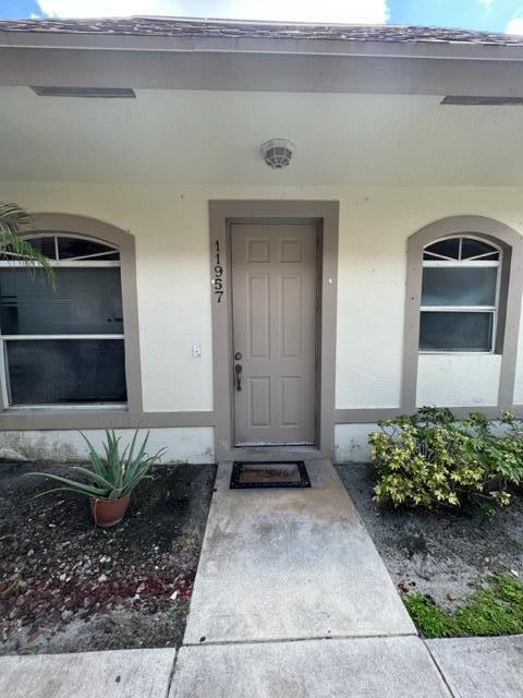 Photo of 11957 Sturbridge Lane, Wellington, FL 33414 (MLS # B26060260)