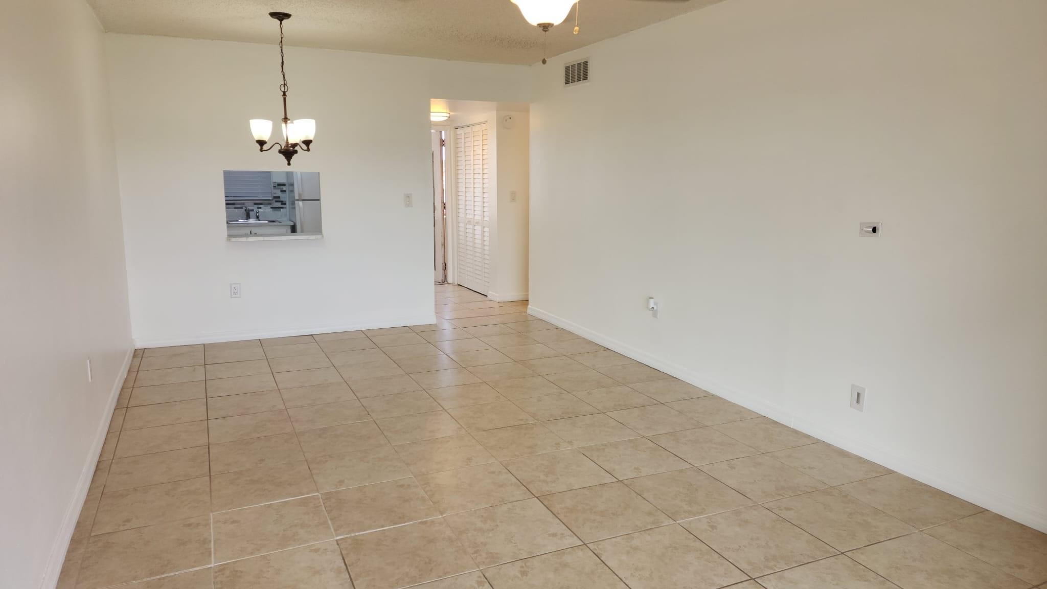 PRICE REDUCED. SELLER MOTIVATED. Beautifully renovated 1 bedroom condo unit. Kitchen newly renovated with new countertops and condo freshly painted. Spacious with screened patio with new flooring and also freshly painted. Bathroom and bedroom has new flooring and renovated bathroom. screened patio overlooking manicured landscaping. Water and cable included in association fee. Great amenities including pools, Gym, tennis and shuffle courts. club house with activities. close to highways, shops, hospitals and bus routes