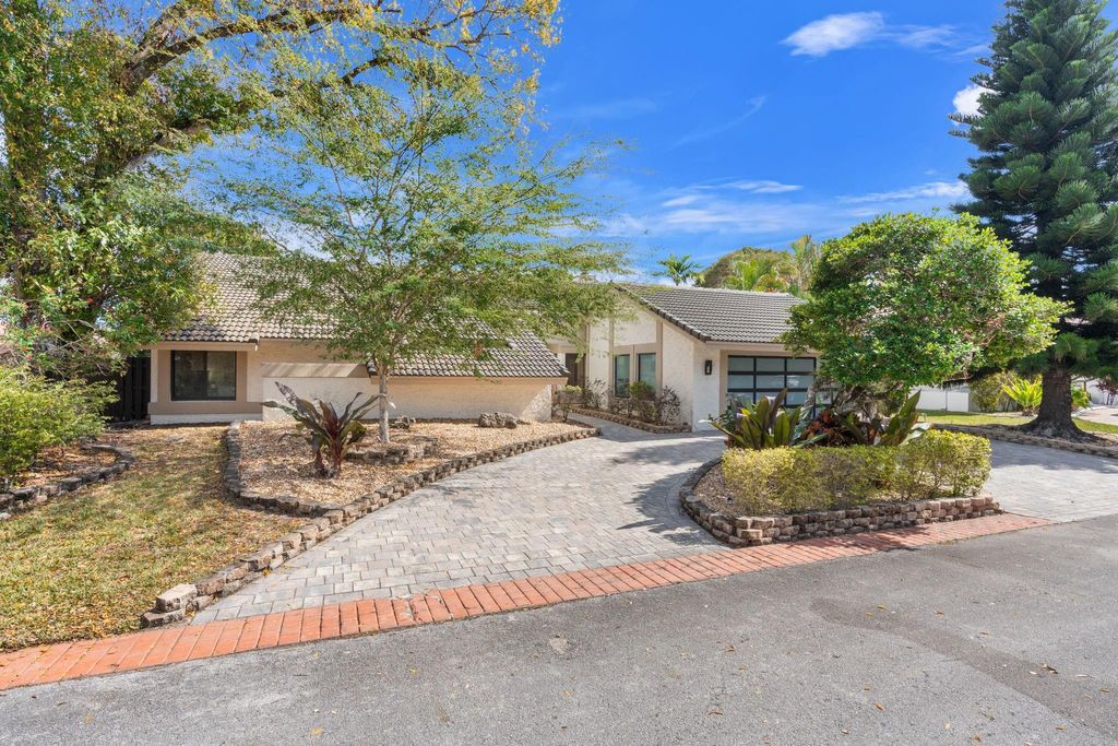 Photo of 7554 Black Olive Avenue, Tamarac, FL 33321 (MLS # F10551946)