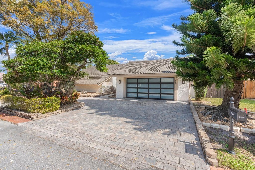 Photo of 7554 Black Olive Avenue, Tamarac, FL 33321 (MLS # F10551946)