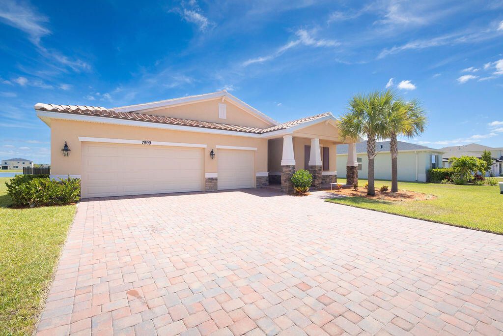Photo of 7599 NW Deysbrook Lane, Port Saint Lucie, FL 34987 (MLS # R10979783)