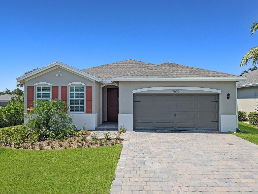 Photo of 1630 NE Skyhigh Terrace, Jensen Beach, FL 34957 (MLS # R10799483)