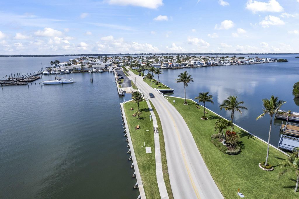 Photo of 1020 Nettles Boulevard, Jensen Beach, FL 34957 (MLS # R10977801)