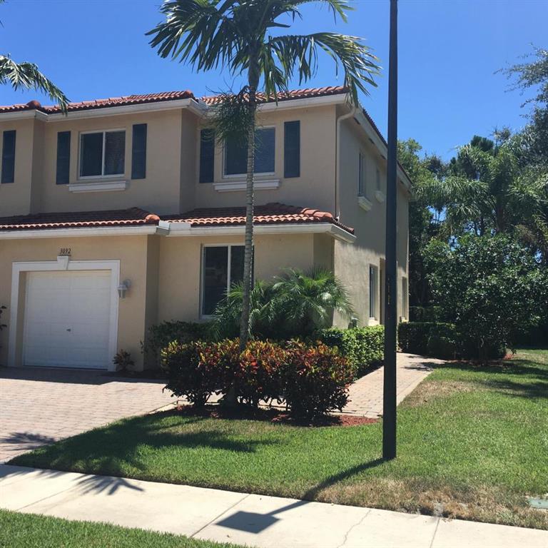 GORGEOUS EAST BOYNTON TOWNHOME WITH A HUGE YARD! FEELS LIKE A SINGLE FAMILY HOME, JUST UNDER 2000 SQ. FT. Fresh paint throughout, brand new berber carpet throughout second floor, brand new stainless steel frig., spacious yard & extended patio for outdoor BBQ. There is also a private greenbelt reserve behind this particular location which gives you much privacy. Just minutes from Renaissance Commons and the Boynton Beach Mall. Owner says no large dogs. Move-in requirement is first, last and security. Applicant(s) must have: a combined gross income of (3) times the monthly rent and a minimum credit score of 650 is desired.