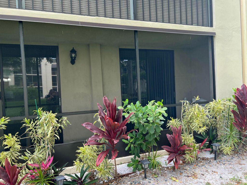 Photo of 5220 Las Verdes Circle #101, Delray Beach, FL 33484 (MLS # B26030226)