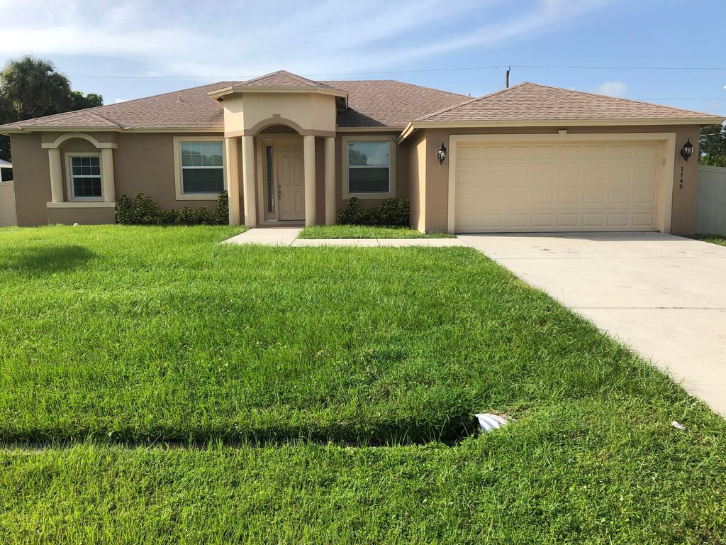 Photo of 1165 SW Eleuthera Avenue, Port Saint Lucie, FL 34953 (MLS # R10794036)