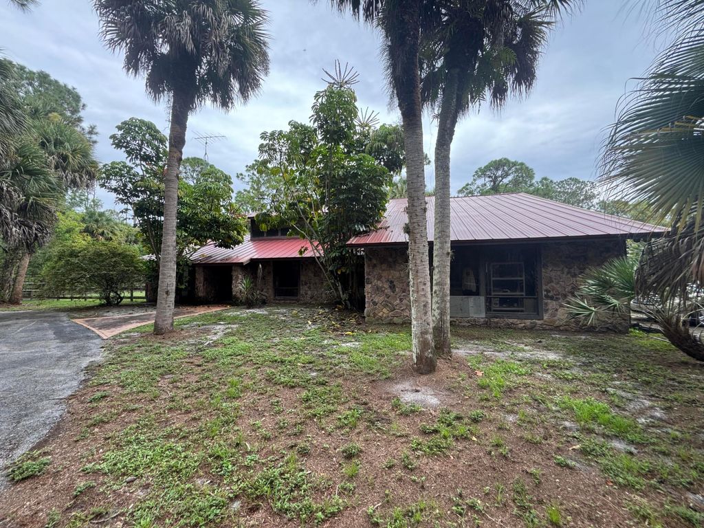 Photo of 2730 Doe Trail, The Acreage, FL 33470 (MLS # R11126618)