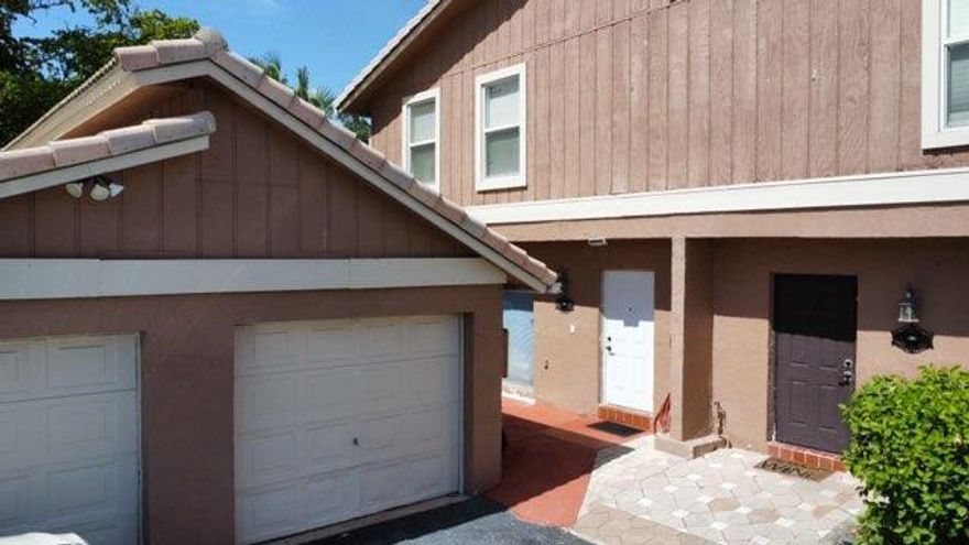 5 BEDROOM 3 FULL BATH TOWNHOUSE IS LOCATED IN CORAL SPRINGS. THIS BEAUTIFULLY UPDATED TOWNHOME HAS IMPACT WINDOWS ON THE TOP FLOOR. THE AC WAS REPLACED IN 2019, THE ELECTRIC PANEL UPDATED IN 2022.  LARGE BEDROOM ON THE GROUND FLOOR. FULL BATH ON GROUND FLOOR AS WELL WITH WALK IN SHOWER. 4 BEDROOMS ARE LOCATED UPSTAIRS INCLUDING A LARGE PRIMARY BEDROOM. THERE IS A FENCED IN PATIO ON A CANAL. CLOSE TO SHOPPING AND PARK. MANY RESTAURANTS ARE NEARBY. PERECT PLACE TO CALL HOME.