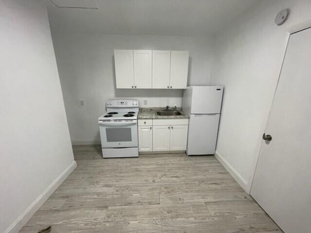 Photo of 3890 Lakewood Road #1, Palm Springs, FL 33461 (MLS # R11069037)