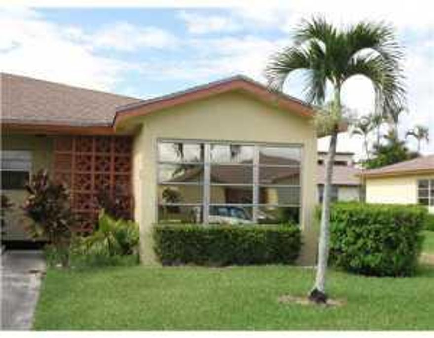 Come spend the winter in this corner villa located in active 55+ community with many social activities.  Two bedrooms and two bathrooms. Beautiful new tile floors, new couches in living room, new master bedroom furniture and dining room set. Large bedrooms! Take advantage of this opportunity to escape the cold winters.