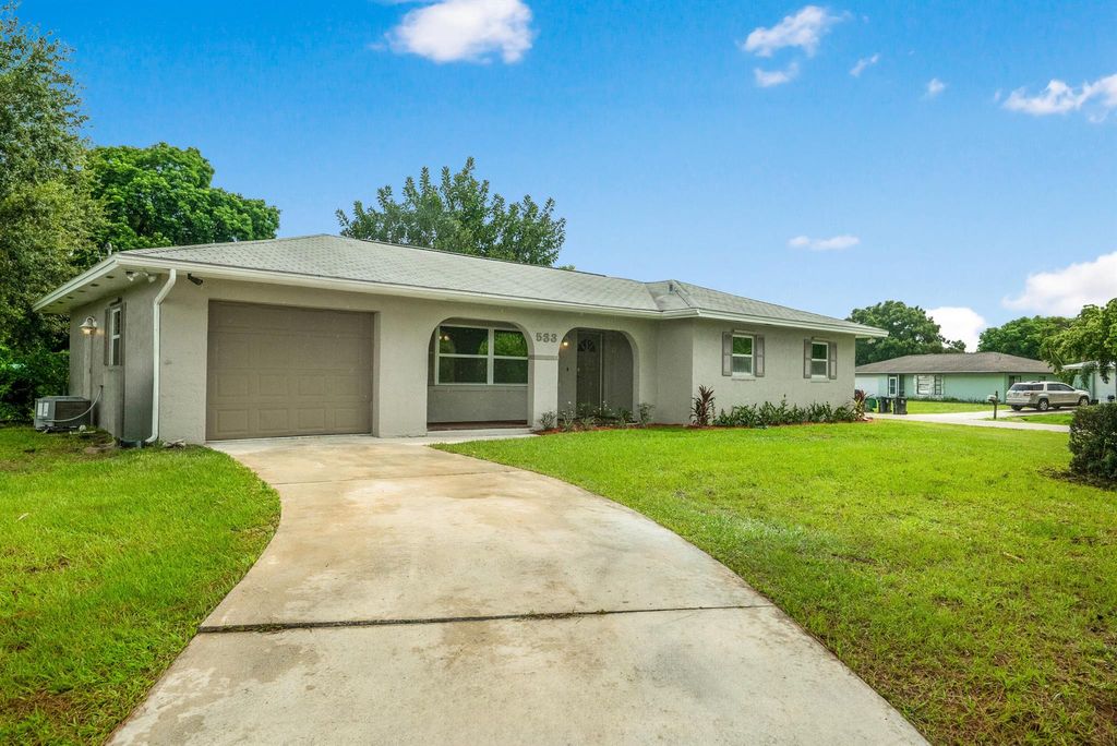Photo of 533 SE Keyes Street, Port Saint Lucie, FL 34983 (MLS # R10999785)