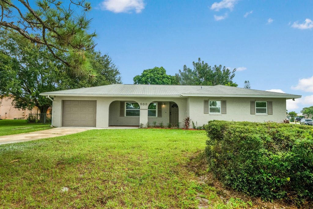 Photo of 533 SE Keyes Street, Port Saint Lucie, FL 34983 (MLS # R10999785)