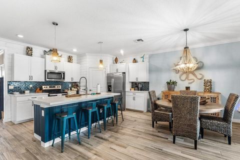 Photo of 1614 NE White Pine Terrace, Ocean Breeze, FL 34957 (MLS # B26029302)