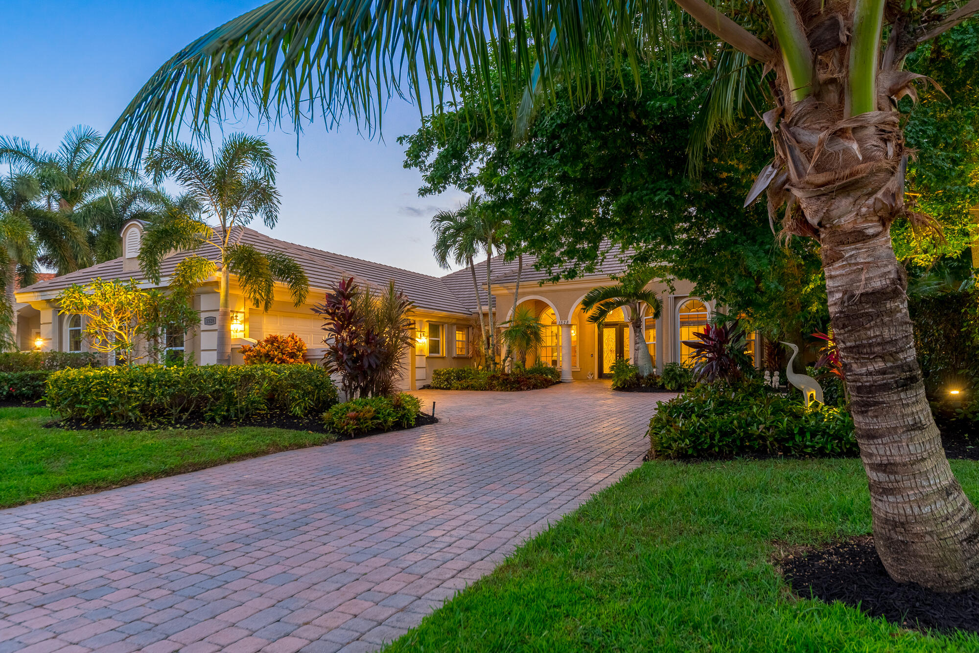 This is the one you have been waiting for! Wide St Lucie River views with breath taking sunsets. There are 4 bedrooms, 5 bathrooms, 3 car garage, office with beautiful cabinetry, gorgeous pool with spa, your own private beach area where you can launch your paddle boards or canoes. Travertine marble floors through out the home. This home lacks nothing, especially a master closet that will blow you away. Located in a gated community with a Jack Nicklaus Signature Golf Course and a 67 slip Marina. This location offers beaches close by, Downtown Stuart, restaurants, and shopping. This home comes with a boat slip and a lift for all your boating adventures. Must see!